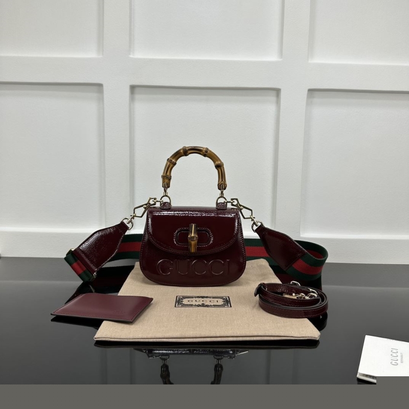 G*u*i top handle bags